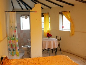 This Oct. 2, 2015 photo shows a room in a private home used for tourist homestays in Ollantaytambo, Peru. Ollantaytambo is a gateway for tourists heading to Machu Picchu. The homestays allow visitors to live like a local for a night while bolstering the local economy. (AP Photo/Fritz Faerber)