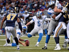 Lions kicker Matt Prater (5) kicks an extra point against the Rams during the second half at the Edward Jones Dome in St. Louis last season. (Jasen Vinlove/USA TODAY Sports)