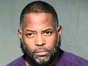 This undated law enforcement file booking photo provided by the Maricopa County, Ariz., Sheriff's Department shows Abdul Malik Abdul Kareem. Kareem was found guilty of plotting with others to attack a "Draw Mohammed" cartoon contest in Texas. (Maricopa County Sheriff's Department via AP, File)