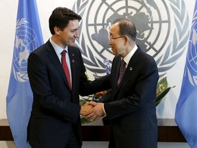 Canadian Prime Minster Justin Trudeau (L) shakes hands with United Nations Secretary General Ban Ki-moon during a photo opportunity at United Nations Headquarters in the Manhattan borough of New York, March 16, 2016. REUTERS/Adrees Latif