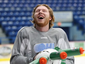 Patrick Murphy shares a laugh with training staff during a Sudbury Wolves practice at the Sudbury Community Arena in Sudbury, Ont. on Wednesday March 16, 2016.