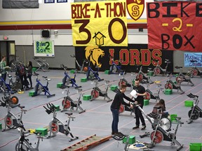 EDMONTON, ALTA: MARCH 17, 2016 -- Participants prepare for the Bike2Box, 1200 person, 24-hour bikeathon on Friday, in support of ShelterBox Canada in the gym at Strathcona High School in Edmonton, March 17, 2016. This is the culmination for students at Scona in their eight week campaign with the goal of raising over $300,000. (ED KAISER/PHOTOGRAPHER)