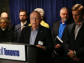 Former mayor David Crombie and a group of Toronto VIPs announce their support for implementing supervised injection sites across the city Thursday, March 17, 2016. (Jack Boland/Toronto Sun)
