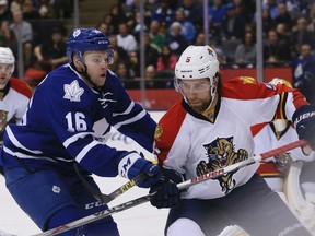 Connor Brown of the Toronto Maple leafs makes his debut against Aaron Ekblad #5 of the Florida Panthers on Thursday March 17, 2016 at the Air Canada. (Veronica Henri/Toronto Sun)