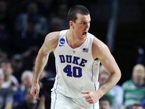 Duke centre Marshall Plumlee lets out a yell towards his bench as he heads up court after a basket against North Carolina-Wilmington in the second half during the first round of the NCAA college basketball tournament in Providence, R.I., on Thursday, March 17, 2016. (Charles Krupa/AP Photo)