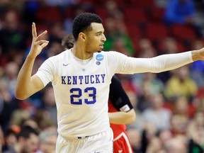 Kentucky guard Jamal Murray reacts after making a 3-point basket during the second half of a first-round men's NCAA Tournament game against Stony Brook in Des Moines, Iowa, on Thursday, March 17, 2016. (Charlie Neibergall/AP Photo)