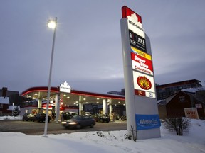 A Petro-Canada sign shows unleaded petrol priced at 77.9 cents ($0.58) per litre at a gas station in Ottawa. A decline in gasoline prices has caused Canada's annual inflation rate to lower to 1.4% in February. REUTERS/Chris Wattie