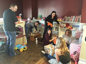 Daytona Homes employees help out at Ronald McDonald House earlier this month.