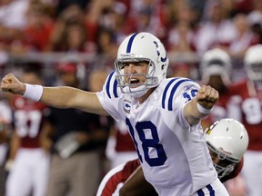 In this Sept. 27, 2009, file photo, Indianapolis Colts' Peyton Manning shouts signals to teammates as they play the Arizona Cardinals in the second quarter of a football game in Glendale, Ariz. A person with knowledge of the decision tells The Associated Press on Sunday, March 6, 2016, that Manning has informed the Denver Broncos he's going to retire. (AP Photo/Ross D. Franklin, File)