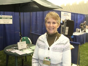 Carol Hegadorn, a member of the Rideau 1000 Islands Master Gardeners, was representing her organization, which provides free advice to home gardeners, at the weekend's home, cottage and boat show in Kingston. (Michael Lea/The Whig-Standard)