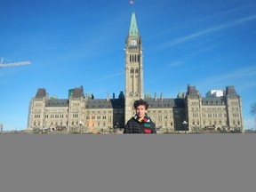 Calen Goulden, 15, in front of the Centennial Flame on Parliament Hill in Ottawa last week. Goulden won the chance to visit Ottawa after receiving 100 per cent on a mock citizenship test - Photo submitted.