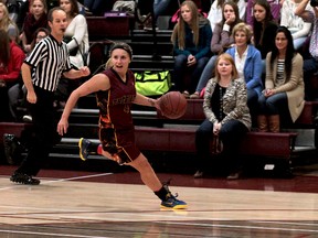 Theriault Flammes standout Kayla Deschatelets, pictured here during the OFSAA AA girls basketball championships in her hometown of Timmins on Oct. 2, 2015, will be suiting up for the Laurentian Voyageurs next season.