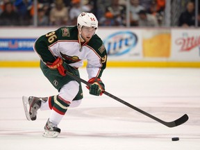 In this Friday, March 1, 2013 photo, Minnesota Wild winger Pierre-Marc Bouchard skates with the puck against the Anaheim Ducks in Anaheim. (THE CANADIAN PRESS/AP, Mark J. Terrill)