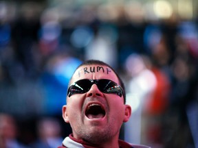 Jasen Tropf cheers while waiting for Republican presidential candidate Donald Trump to speak at a campaign rally in Salt Lake City. (AP Photo/John Locher)