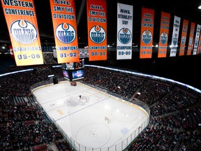 The Edmonton Oilers banners are seen in the rafters of Rexall Place, which will host its final NHL game on April 6. Fans grew anxious upon learning Friday the opening faceoff has been moved up from 8 p.m. to 5 p.m. (Ian Kucerak)