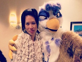 Debra Soh,a sexual addiction researcher with the faculty of health at York University, poses with a furry. Handout/Postmedia Network