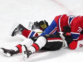 Montreal Canadiens defenceman P.K. Subban falls on Ottawa Senators right winger Bobby Ryan during third-period action at Bell Centre in Montreal on Dec. 12, 2015. (Jean-Yves Ahern/USA TODAY Sports)