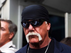 Hulk Hogan, whose given name is Terry Bollea walks out of the courthouse on March 18, 2016, in St. Petersburg, Fla. Bollea was awarded $115 million in damages in his lawsuit against the gossip website Gawker on Friday.  (Eve Edelheit/The Tampa Bay Times via AP)