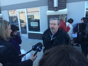 An emotional Robert Krull addressed the media before a throng of volunteers headed out to put up posters for his missing wife Thelma March 19, 2016.