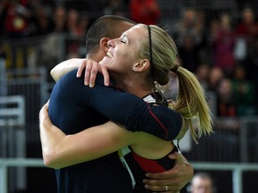 Brianne Theisen Eaton embraces her husband Ashton Eaton after winning the pentathlon during the 2016 IAAF World Championships in Athletics at the Oregon Convention Center. (Kirby Lee/USA TODAY Sports)