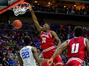 Indiana Hoosiers center Thomas Bryant dunks the ball against Kentucky Wildcats forward Alex Poythress in the second half during the second round of the 2016 NCAA Tournament at Wells Fargo Arena. (Jeffrey Becker/USA TODAY Sports)