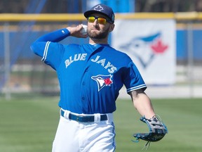 Toronto Blue Jays' Kevin Pillar throws at the team's spring training facility, in Dunedin, FL, on Saturday, Feb. 27, 2016. (THE CANADIAN PRESS/Frank Gunn)