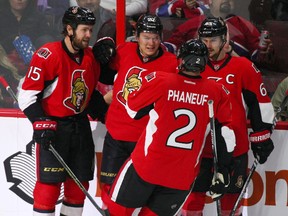 Ottawa Senators right winger Curtis Lazar celebrates his second-period goal against the Montreal Canadiens with teammates at Canadian Tire Centre in Ottawa on March 19, 2016. (Jean-Yves Ahern/USA TODAY Sports)