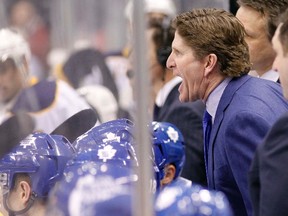 Toronto Maple Leafs head coach Mike Babcock talks to an official during the third period against the Buffalo Sabres at the Air Canada Centre in Toronto on March 19, 2016. (John E. Sokolowski/USA TODAY Sports)