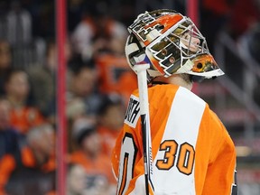 Goalie Michal Neuvirth of the Philadelphia Flyers looks on after allowing a goal against the Calgary Flames during the first period at Wells Fargo Center in Philadelphia on Feb. 29, 2016. (Patrick Smith/Getty Images)