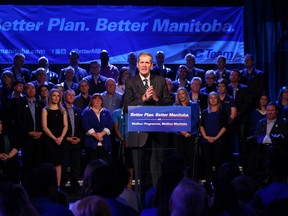 Surrounded by his party's candidates, Leader Brian Pallister delivers his address during the provincial Progressive Conservative party's election launch at the Caboto Centre on Wilkes Avenue in Winnipeg on Sat., March 12, 2016. (Kevin King/Winnipeg Sun/Postmedia Network)