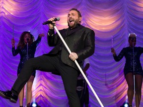 Country star Johnny Reid performs for an appreciative crowd at Budweiser Gardens Sunday. (CRAIG GLOVER, The London Free Press)