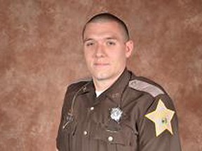 Deputy Carl A. Koontz, 27, of the Howard County Sheriff Department is seen in an undated photo provided by the Indiana State Police. Howard County Sheriff Steven Rogers says Deputy Koontz died at an Indianapolis hospital after being shot about 12:30 a.m. Sunday at a mobile home in Russiaville, about 60 miles north of Indianapolis. Indiana State Police say a second deputy, Sgt. Jordan Buckley, also was shot and is in stable condition, alert and conscious. The suspected shooter, who has not been identified, died. (AP Photo/Indiana State Police)