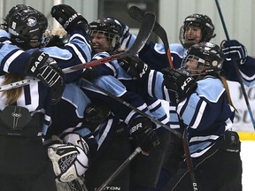 Polar Ice celebrate their win over Northern Stars in Game 2 of the Manitoba Women's Junior Hockey League final at MTS Iceplex in Headingley, Man., on Sat., March 19, 2016. Polar Ice swept the best-of-three final 2-0. Kevin King/Winnipeg Sun/Postmedia Network