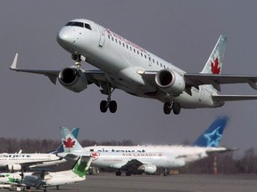 An Air Canada jet takes off from Halifax Stanfield International Airport in Enfield, N.S., on March 8, 2012. The Canadian Human Rights Tribunal is investigating whether the country's largest airline discriminated against an Arab-Canadian man through overzealous use of U.S. aviation security lists. (THE CANADIAN PRESS/Andrew Vaughan)