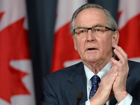 Former Supreme Court Justice Ian Binnie speaks at a news conference in Ottawa on Monday, March 21, 2016. THE CANADIAN PRESS/Adrian Wyld