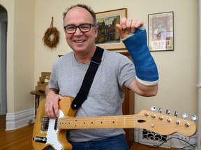 London blues guitarist Teddy Leonard fell and broke his left wrist in early March, leaving him unable to perform. (MORRIS LAMONT, The London Free Press)