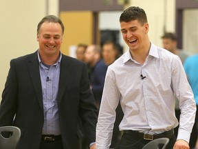 Dale Hawerchuk and Mark Scheifele shared some laughs while telling their stories to students at Dakota Collegiate on Monday.