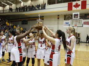 Members of the Sisler Spartans celebrate after winning their second straight Manitoba high school girls 4A championship with a 94-68 victory over the second seeded Vincent Massey Trojans, Monday, March 21, 2016 at the University of Manitoba.
RUSTY BARTON/For the Winnipeg Sun