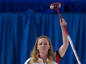 Canada's Chelsea Carey celebrates scoring 4 in the first end during the fifth draw against the United Stares at the Women's World Curling Championship in Swift Current, Sask. Sunday, March 20, 2016. (THE CANADIAN PRESS/Jonathan Hayward)