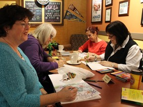 Susan Hall, Catherine Johns, Janice Brown and Jane Lindsay put their pencil crayons to paper during Finch Street Coffee Lodge's weekly Coffee, Colouring and Conversation night on Wednesday, Mar. 16.
CARL HNATYSHYN/SARNIA THIS WEEK