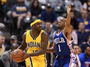 Indiana Pacers guard Ty Lawson (10) is guarded by Philadelphia 76ers guard Ish Smith (1) during the second half at Bankers Life Fieldhouse. Indiana defeats Philadelphia 91-75. Brian Spurlock-USA TODAY Sports