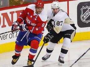 Capitals winger Alex Ovechkin (left) and Penguins centre Sidney Crosby (right) battle earlier this season. The Capitals and Penguins could be a playoff matchup fans would cheer for this spring. (Geoff Burke/USA TODAY Sports)