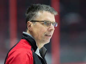 Coach Dave Cameron watches the drills as the Ottawa Senators practice at Canadian Tire Centre in advance of their next game on Tuesday against the St Louis Blues. (Wayne Cuddington)