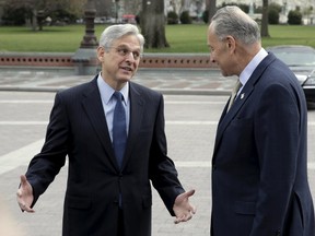 Senator Charles Schumer (D-NY) meets with Judge Merrick Garland, President Obama's Supreme Court nominee, on Capitol Hill in Washington March 22, 2016.  (REUTERS/Joshua Roberts)