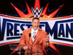 World Wrestling Entertainment star John Cena delivers remarks as WWE executives and elected officials gather on March 8 to announce the return of WrestleMania to Orlando, Fla,., next year. (Joe Burbank/The Associated Press)