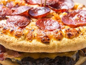 In this March 22, 2016 photo released by the Atlanta Braves, the “Burgerizza” is shown in Atlanta. (Atlanta Braves/Pouya Dianat via AP)