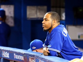 Edwin Encarnacion of the Toronto Blue Jays looks out from the duguout during a game against the Kansas City Royals at the Rogers Centre in Toronto Oct. 20, 2015. (Dave Abel/Toronto Sun/Postmedia Network)