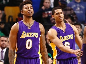 Lakers forward Nick Young (left) and guard Jordan Clarkson (right) were accused of harassing a women's rights activist on Sunday night in Los Angeles. (Mark L. Baer/USA TODAY Sports)