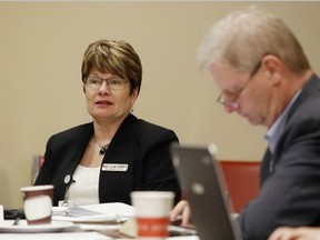 Luke Hendry/The Intelligencer
Quinte Health Care Mary Clare Egberts and chief of staff Dr. Dick Zoutman take part in a board meeting at Prince Edward County Memorial Hospital in Picton Tuesday. While finances remain a prime concern, Egberts said the current corporate focus is on adapting to the changes made to cut $11.5 million for the budget of the next fiscal year, which begins April 1.