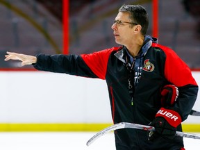 Ottawa Senators head coach Dave Cameron instructs his players during team practice at the Canadian Tire Centre on March 14, 2016. (Errol McGihon/Postmedia)